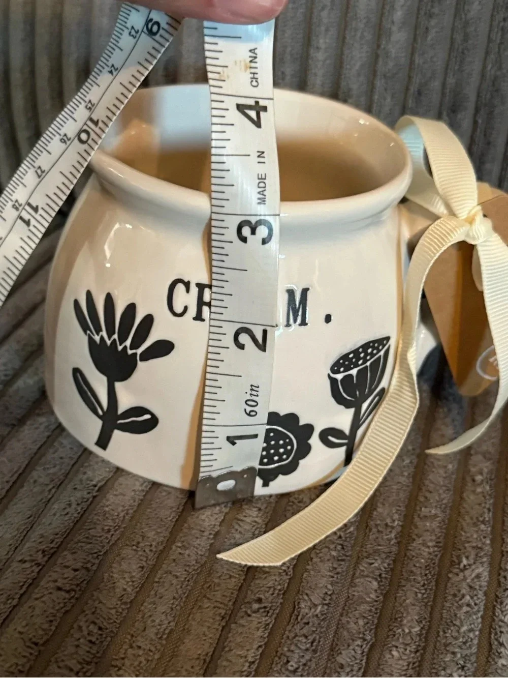 Rae Dunn White Ceramic Creamer with Black Floral Design- CREAM.- NWT